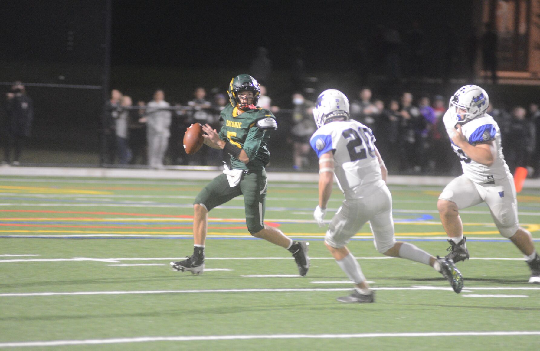Ben Noyes chases Matt McIntosh